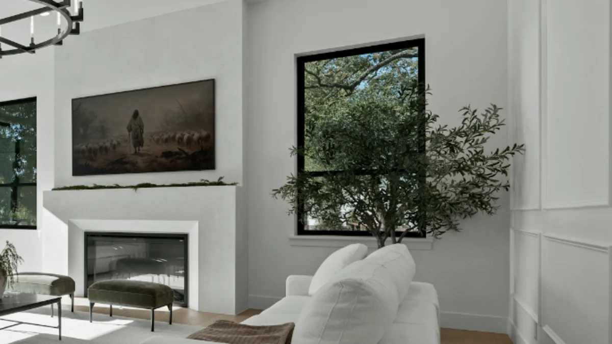 Light-filled living room with fireplace, tall windows and open circulation